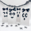 set of 4 boo bags for halloween on white background
