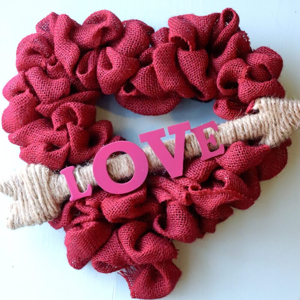 heart shaped wreath for valentine's day on white background