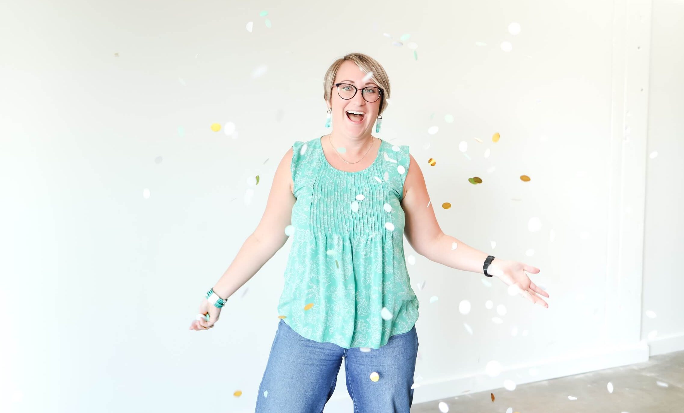 Woman throwing confetti for simple celebrations on white background
