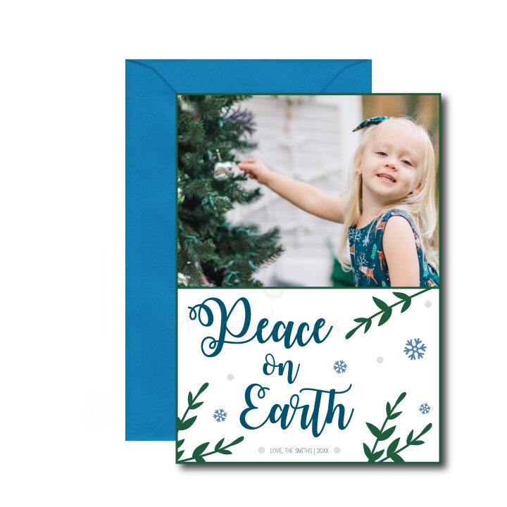 Peace on Earth Christmas Card on white background with blue envelope